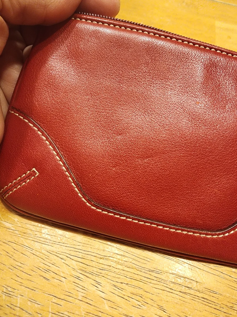vintage Coach red leather Soho mini wristlet pouch featuring white contrast